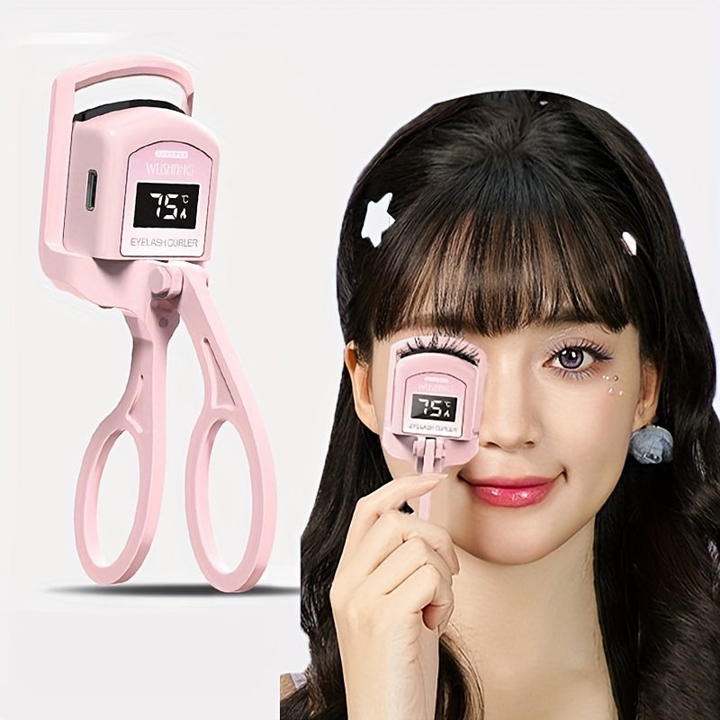 A Pink USB Heated Eyelash Curler with an LED Battery Display, Featuring a Pad That Changes Color with Temperature.