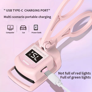 A Pink USB Heated Eyelash Curler with an LED Battery Display, Featuring a Pad That Changes Color with Temperature.